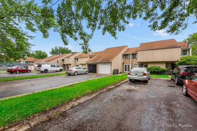 405 S Belmont Ave, Elgin, IL 60123 - multi unit property featuring a garage and driveway