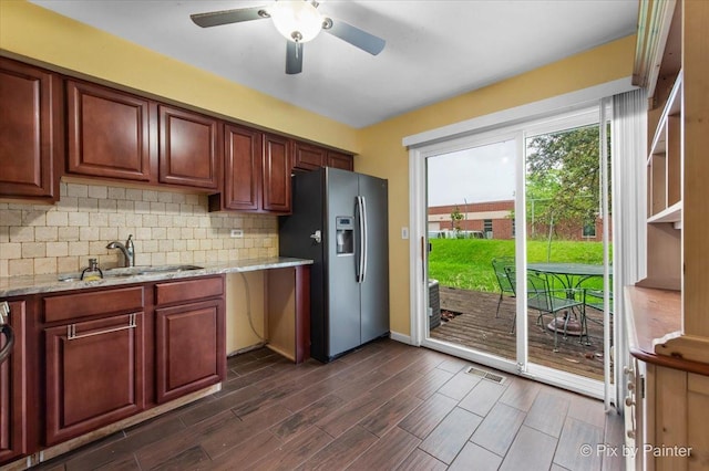 405 S Belmont Ave, Elgin, IL 60123 - kitchen with stainless steel refrigerator with ice dispenser, a sink, backsplash, light stone countertops, and ceiling fan