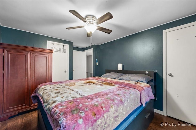 405 S Belmont Ave, Elgin, IL 60123 - bedroom with dark wood-style floors and a ceiling fan