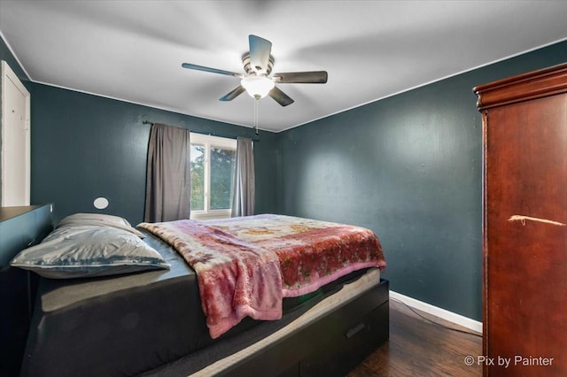 405 S Belmont Ave, Elgin, IL 60123 - bedroom featuring dark wood-type flooring, baseboards, and a ceiling fan