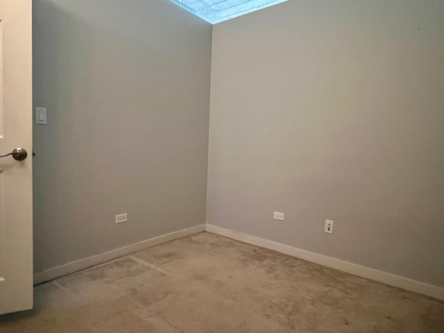 1001 W 15th St Unit 342, Chicago, IL 60608 - spare room with light carpet, a skylight, and baseboards