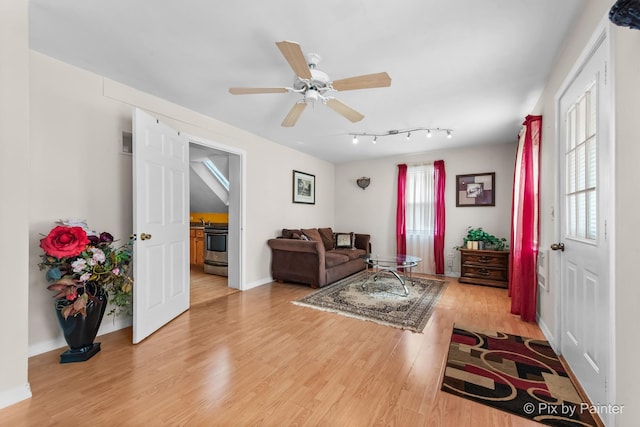 3324 N Ottawa Ave, Chicago, IL 60634 - living room featuring light wood-style flooring and ceiling fan