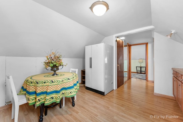 3324 N Ottawa Ave, Chicago, IL 60634 - dining room with light wood finished floors and lofted ceiling