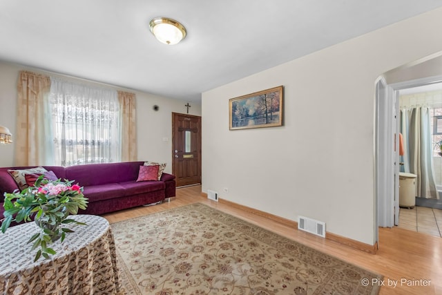 3324 N Ottawa Ave, Chicago, IL 60634 - living area with light wood-style flooring and healthy amount of natural light