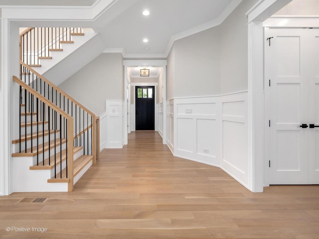 435 S W Ave, Elmhurst, IL 60126 - entrance foyer with ornamental molding, light wood-style floors, a decorative wall, stairs, and recessed lighting
