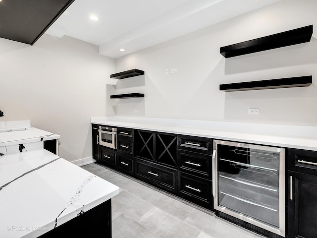 435 S W Ave, Elmhurst, IL 60126 - kitchen featuring dark cabinetry, open shelves, beverage cooler, stainless steel oven, and recessed lighting