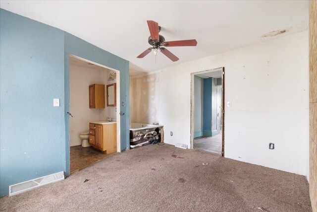2007 3x Ave, East Moline, IL 61244 - unfurnished living room featuring carpet, ceiling fan, and a sink
