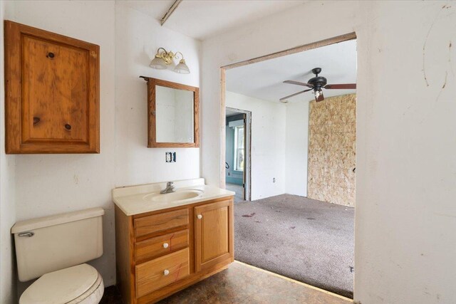 2007 3x Ave, East Moline, IL 61244 - bathroom featuring vanity, a ceiling fan, and toilet