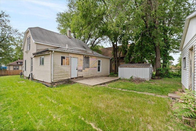2007 3x Ave, East Moline, IL 61244 - rear view of house featuring a patio area and a chimney