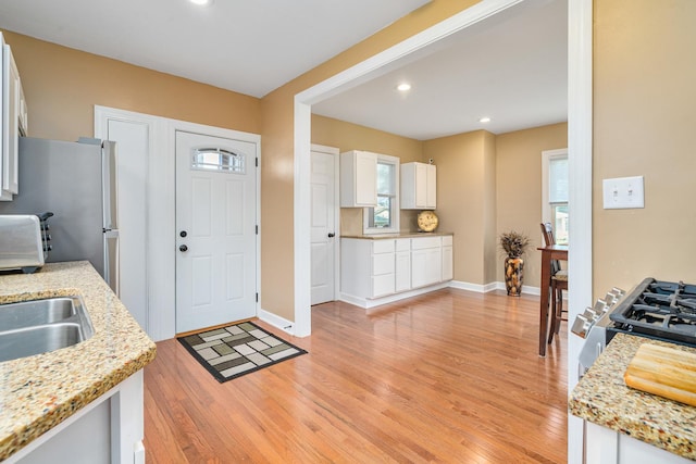 1627 S 14th Ave, Maywood, IL 60153 - foyer entrance featuring light wood-style flooring and recessed lighting