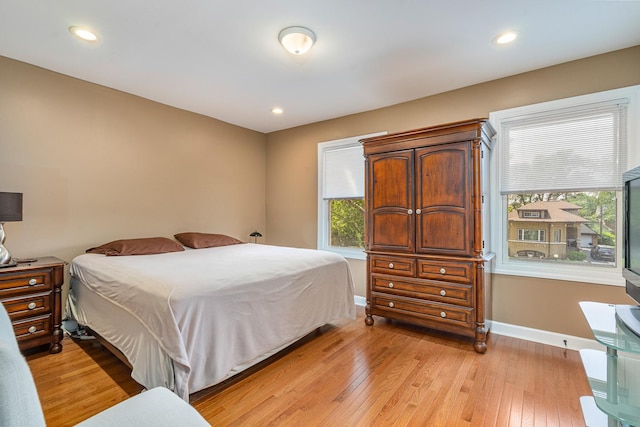 1627 S 14th Ave, Maywood, IL 60153 - bedroom with light wood finished floors and recessed lighting