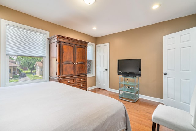 1627 S 14th Ave, Maywood, IL 60153 - bedroom with light wood-type flooring and recessed lighting