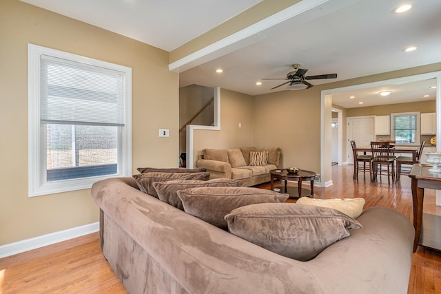 1627 S 14th Ave, Maywood, IL 60153 - living room with light wood finished floors, a ceiling fan, recessed lighting, and stairs
