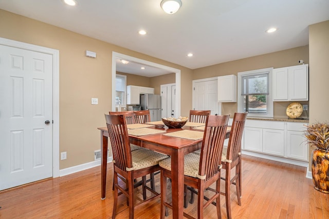 1627 S 14th Ave, Maywood, IL 60153 - dining room with light wood-style floors and recessed lighting