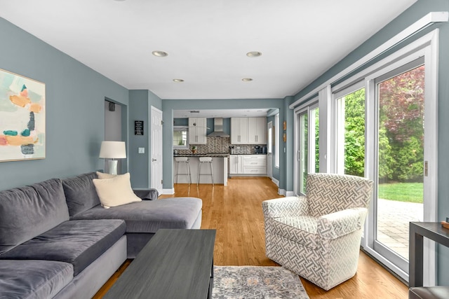 1101 Oak St, Winnetka, IL 60093 - living area with light wood-style flooring, recessed lighting, and baseboards