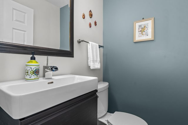 1101 Oak St, Winnetka, IL 60093 - bathroom featuring toilet and vanity
