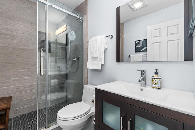 1101 Oak St, Winnetka, IL 60093 - bathroom with toilet, vanity, and a shower stall