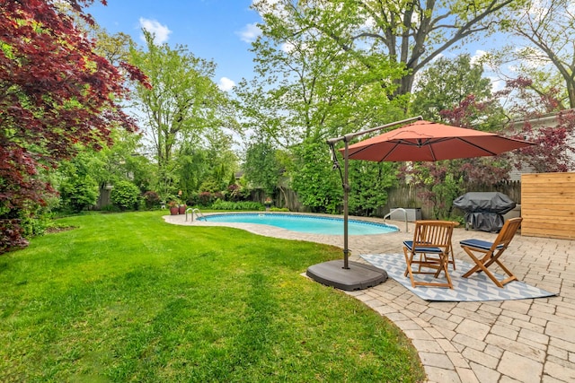 1101 Oak St, Winnetka, IL 60093 - view of swimming pool with a patio area, grilling area, and view of wooded area