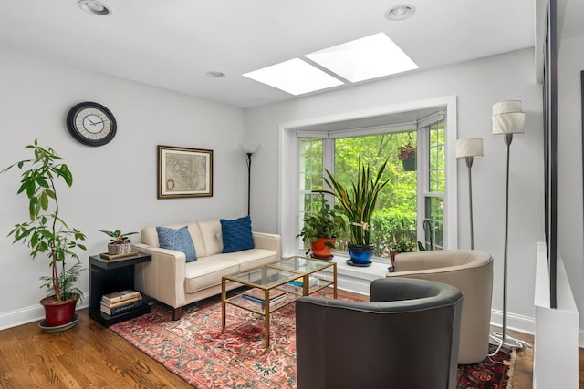 1101 Oak St, Winnetka, IL 60093 - living area with a skylight, wood finished floors, baseboards, and recessed lighting