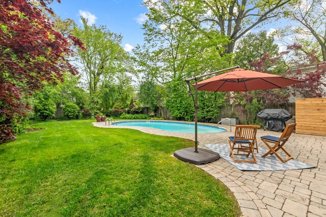 1101 Oak St, Winnetka, IL 60093 - view of swimming pool with a patio, area for grilling, and view of wooded area