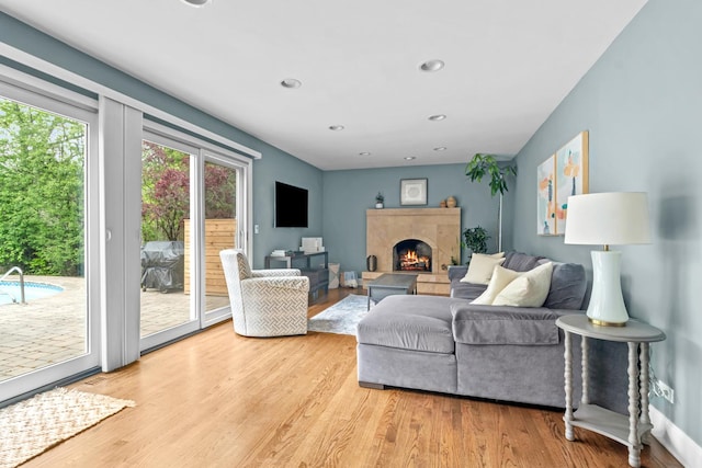 1101 Oak St, Winnetka, IL 60093 - living room featuring a fireplace, light wood-type flooring, and recessed lighting