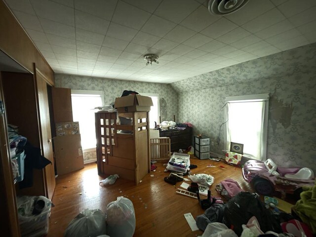 802 Locust St, Prophetstown, IL 61277 - additional living space featuring wallpapered walls and wood-type flooring