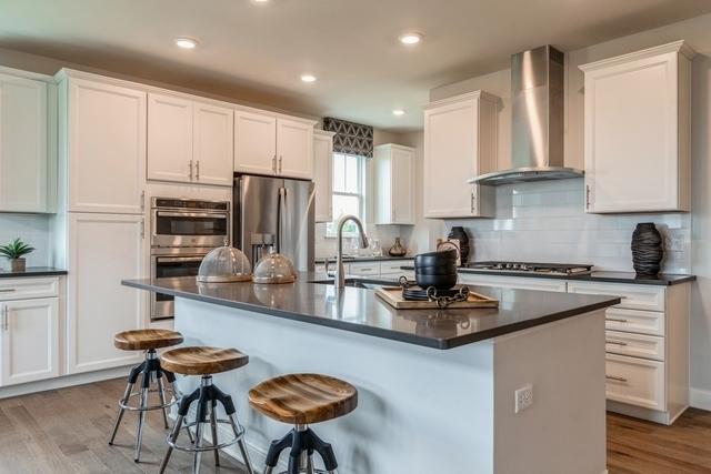 213 Rhinebeck Way, Algonquin, IL 60102 - kitchen featuring wall chimney range hood, appliances with stainless steel finishes, dark countertops, and recessed lighting