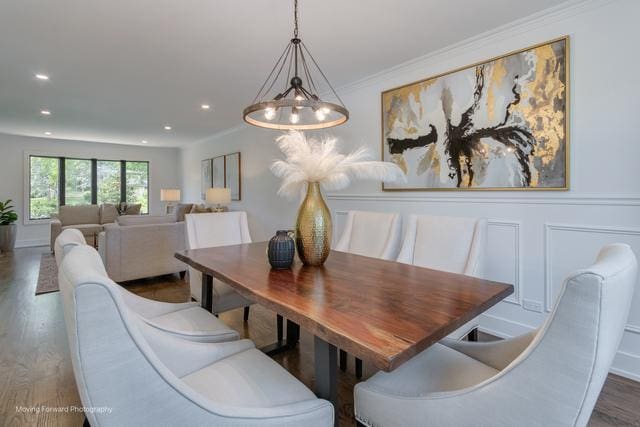 213 Rhinebeck Way, Algonquin, IL 60102 - dining space featuring wood finished floors, a chandelier, a decorative wall, crown molding, and recessed lighting