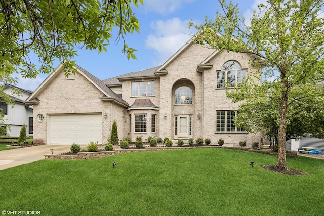 1040 E Buckingham Dr, Naperville, IL 60563 - view of front of property featuring brick siding, concrete driveway, an attached garage, and a front yard