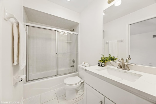 1040 E Buckingham Dr, Naperville, IL 60563 - bathroom with tile patterned floors, vanity, toilet, and enclosed tub / shower combo