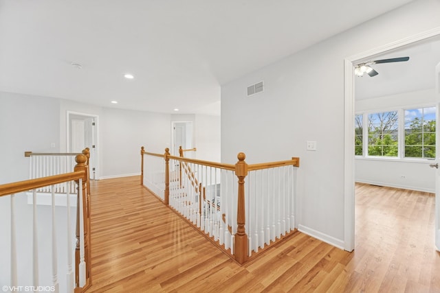 1040 E Buckingham Dr, Naperville, IL 60563 - hallway with an upstairs landing, light wood finished floors, baseboards, and recessed lighting