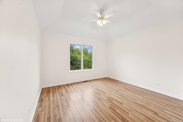 1040 E Buckingham Dr, Naperville, IL 60563 - empty room featuring light wood finished floors, a ceiling fan, and baseboards