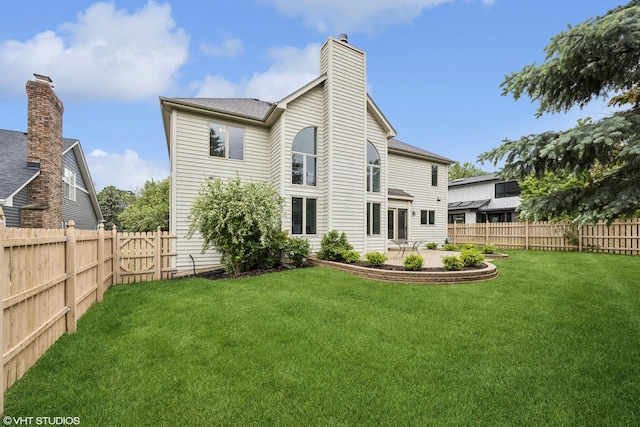 1040 E Buckingham Dr, Naperville, IL 60563 - back of house featuring a chimney and a patio area