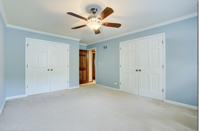 1056 Whirlaway Ave, Naperville, IL 60540 - unfurnished bedroom featuring crown molding, baseboards, light carpet, a closet, and a ceiling fan