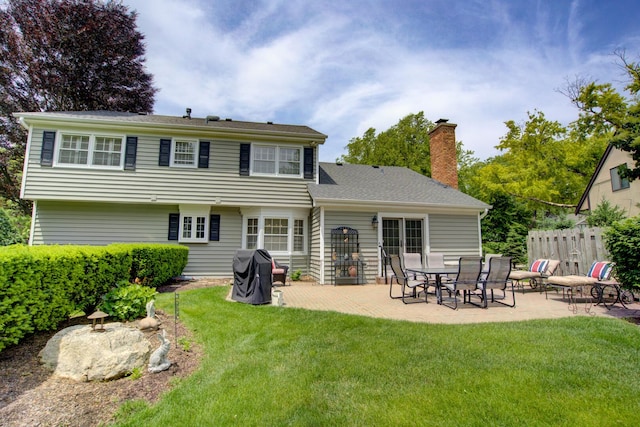 1056 Whirlaway Ave, Naperville, IL 60540 - rear view of house with a patio and a chimney