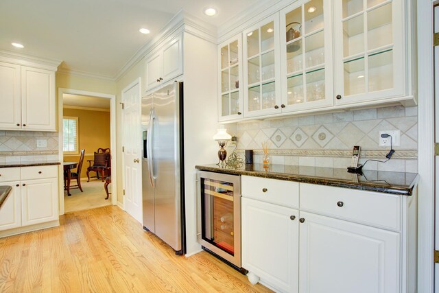 1056 Whirlaway Ave, Naperville, IL 60540 - kitchen with wine cooler, stainless steel refrigerator with ice dispenser, light wood-style flooring, white cabinets, and crown molding