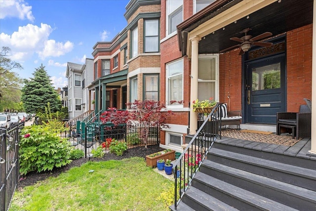 3828 N Wilton Ave, Chicago, IL 60613 - doorway to property featuring a ceiling fan, brick siding, and a residential view