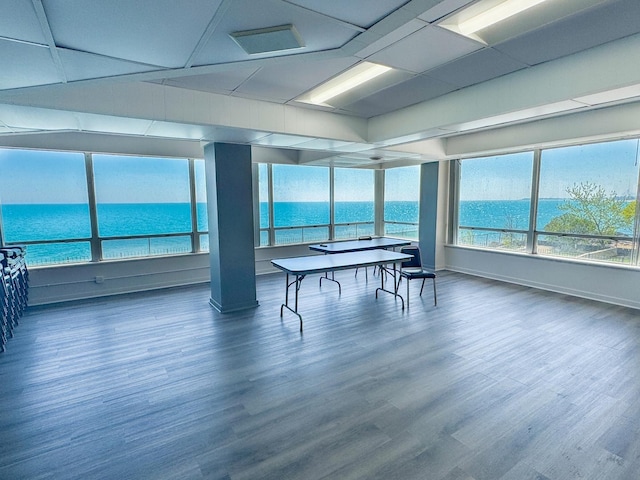 6301 N Sheridan Rd Unit 14E, Chicago, IL 60660 - playroom with a water view, dark wood-style flooring, and baseboards