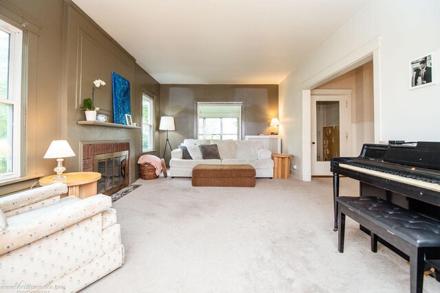 456 S Indiana Ave, Kankakee, IL 60901 - living room with a fireplace and light carpet