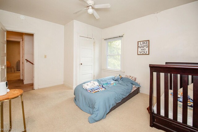 456 S Indiana Ave, Kankakee, IL 60901 - carpeted bedroom featuring baseboards, ceiling fan, and a closet