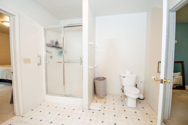 456 S Indiana Ave, Kankakee, IL 60901 - ensuite bathroom featuring a shower stall, baseboards, and tile patterned floors