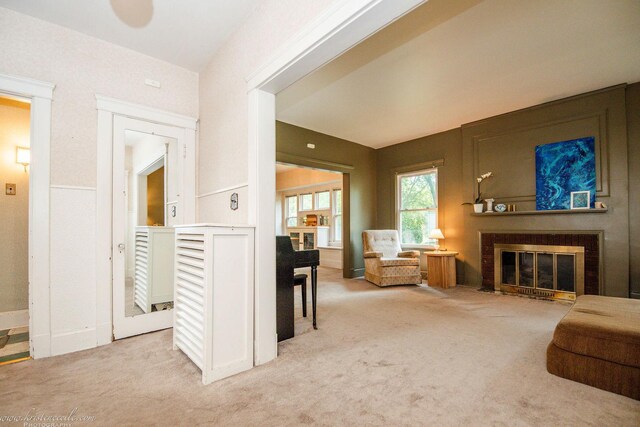 456 S Indiana Ave, Kankakee, IL 60901 - living area featuring carpet floors and a fireplace with flush hearth