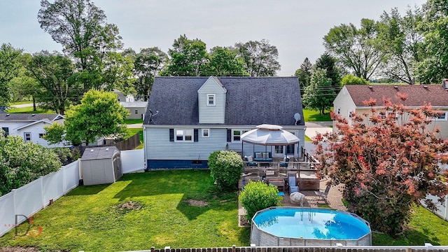 907 Parks Ln, Ottawa, IL 61350 - back of house with a gazebo, an outdoor pool, and a shingled roof