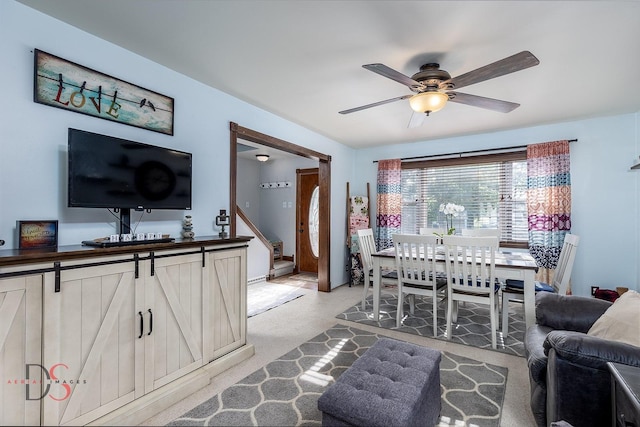 907 Parks Ln, Ottawa, IL 61350 - living room featuring ceiling fan, stairs, and light carpet