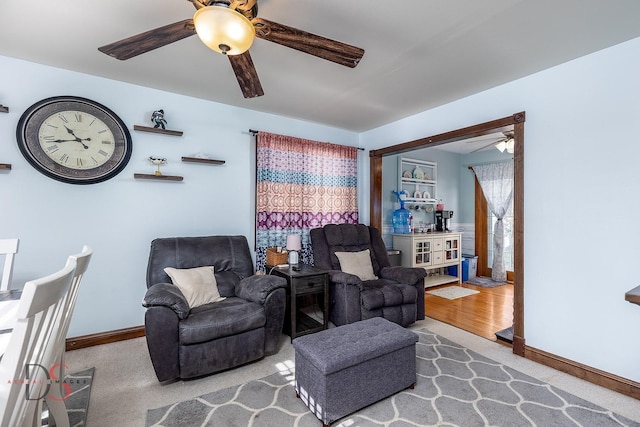 907 Parks Ln, Ottawa, IL 61350 - living room featuring a ceiling fan, baseboards, and carpet floors