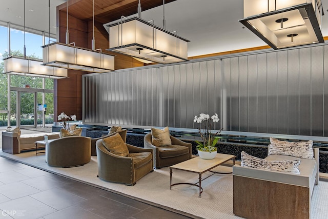 500 W Superior St Unit 805, Chicago, IL 60654 - community lobby with wooden walls, a wall of windows, and a towering ceiling