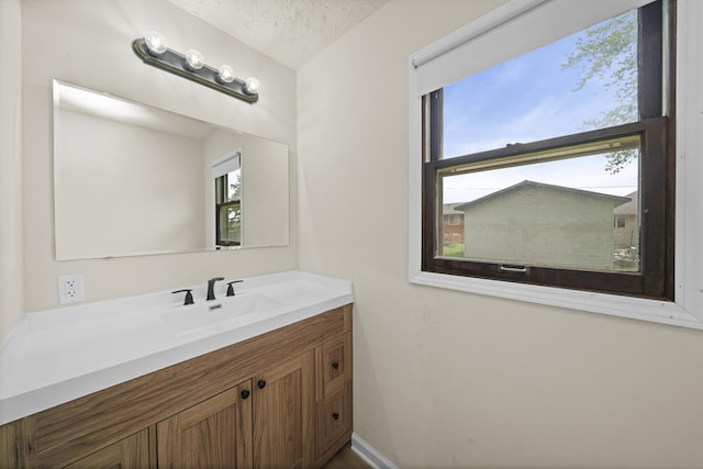 119 Cook Ct, Somonauk, IL 60552 - bathroom featuring vanity and baseboards