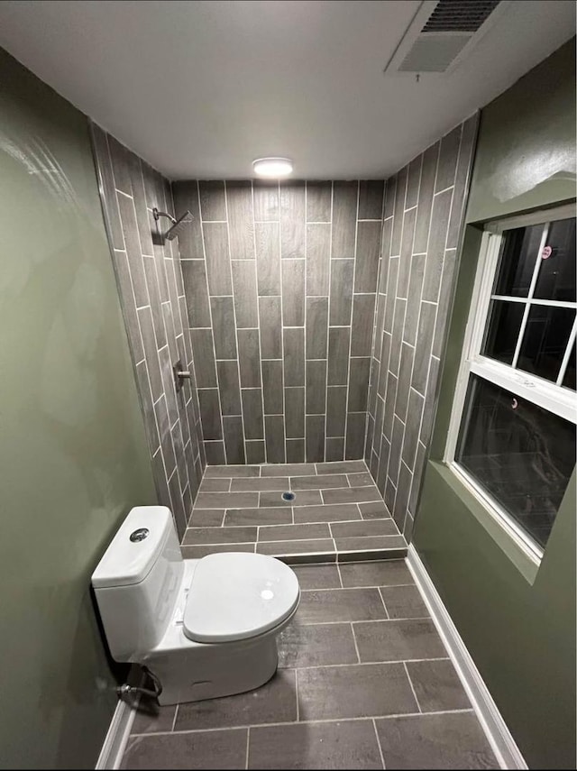 3628 N Nordica Ave, Chicago, IL 60634 - bathroom featuring tiled shower and toilet