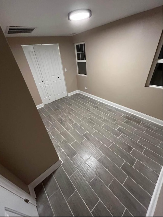 3628 N Nordica Ave, Chicago, IL 60634 - unfurnished bedroom with baseboards and a closet