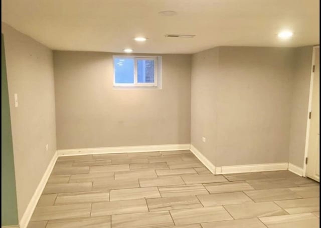 3628 N Nordica Ave, Chicago, IL 60634 - below grade area featuring recessed lighting, wood finish floors, and baseboards